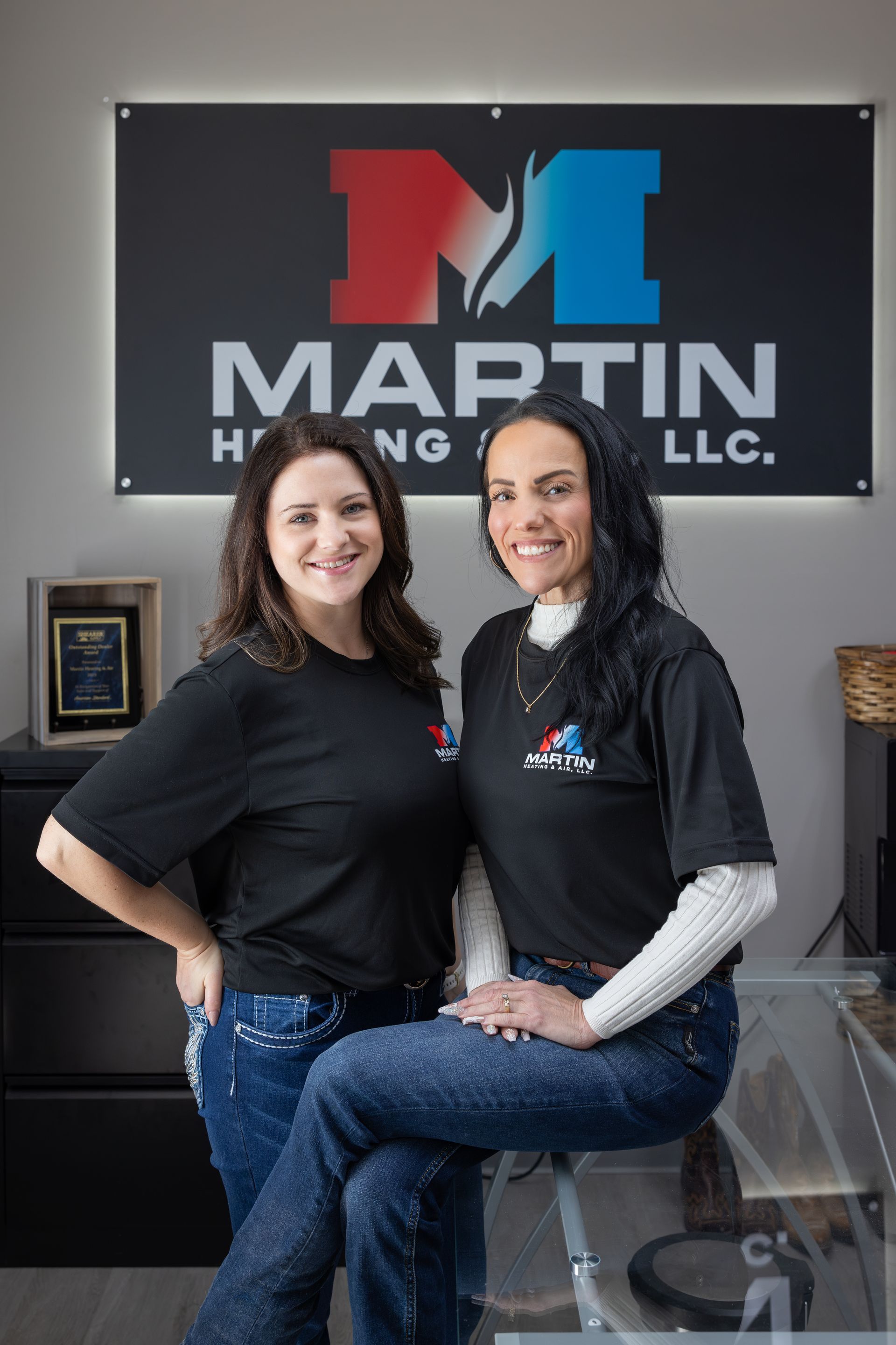 A man is installing a filter on the ceiling of a room.