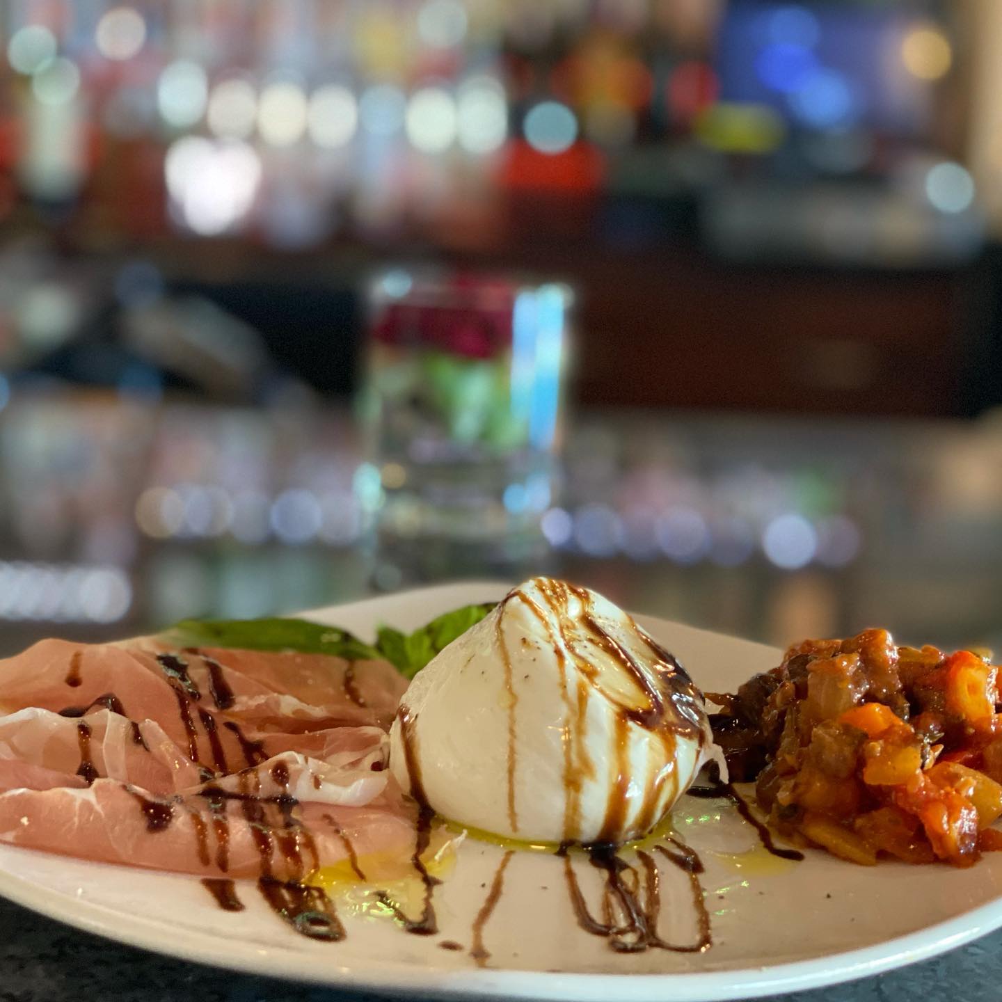 Fresh Creamy Burrata Cheese with Prosciutto and Sicilian Caponata