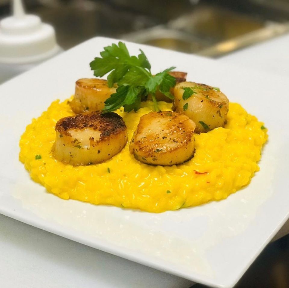 Seared sea scallops with saffron risotto