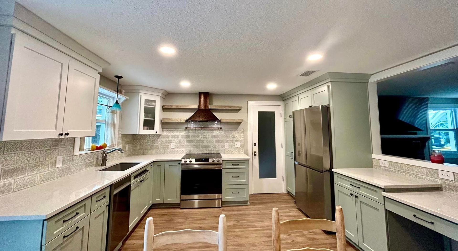 Quartz Countertop With Green Cabinets — Jacksonville, FL — Champagne Stone Company