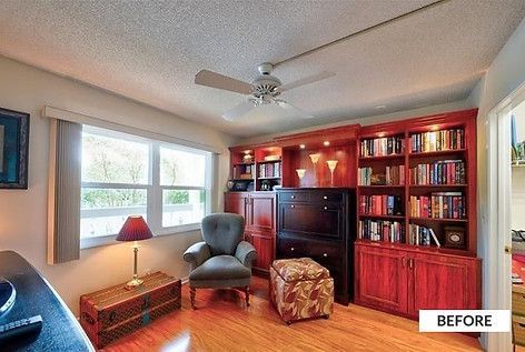 A home office with built-in bookshelves, a chair, and a desk.