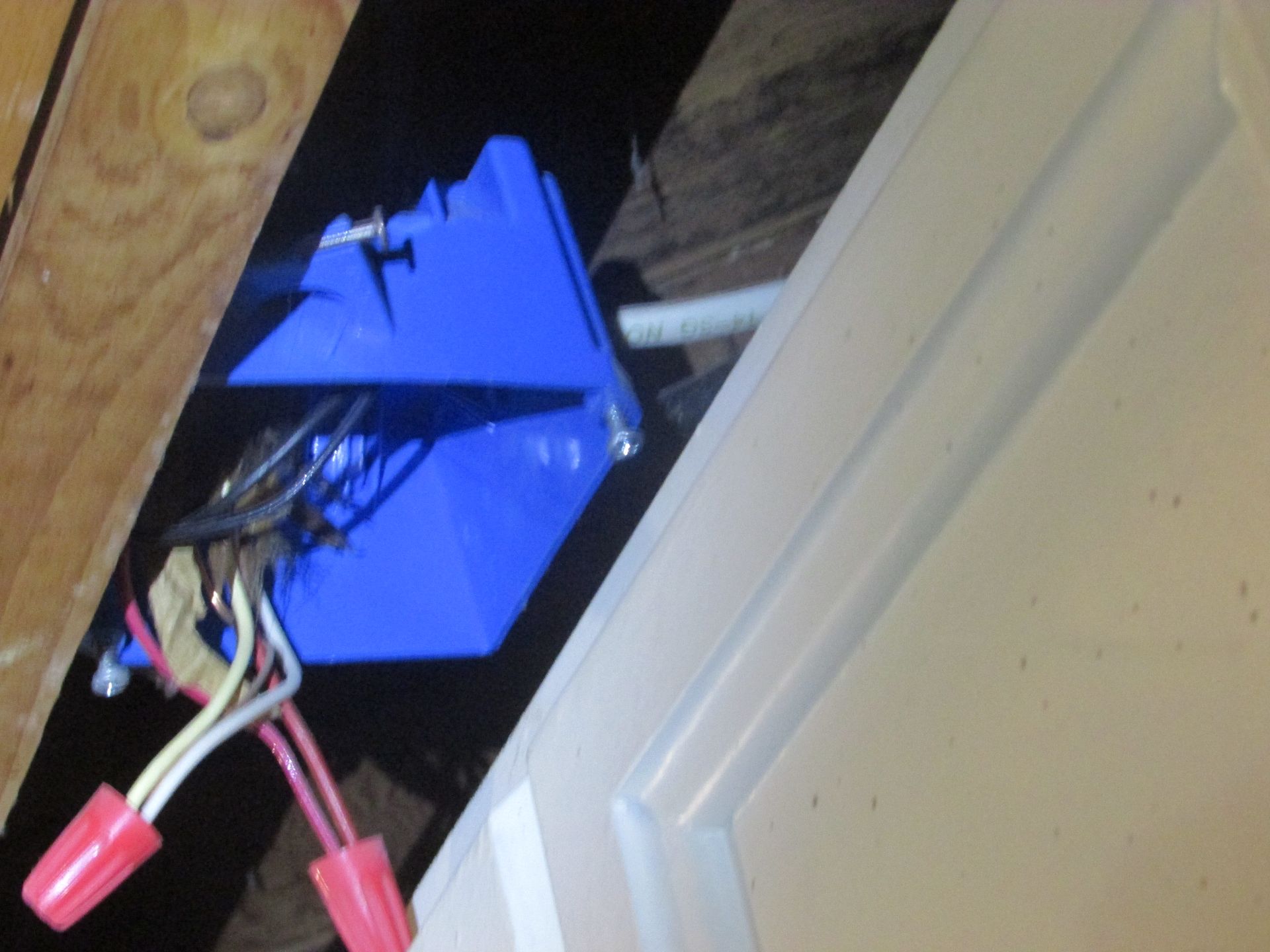 A blue box with wires coming out of it