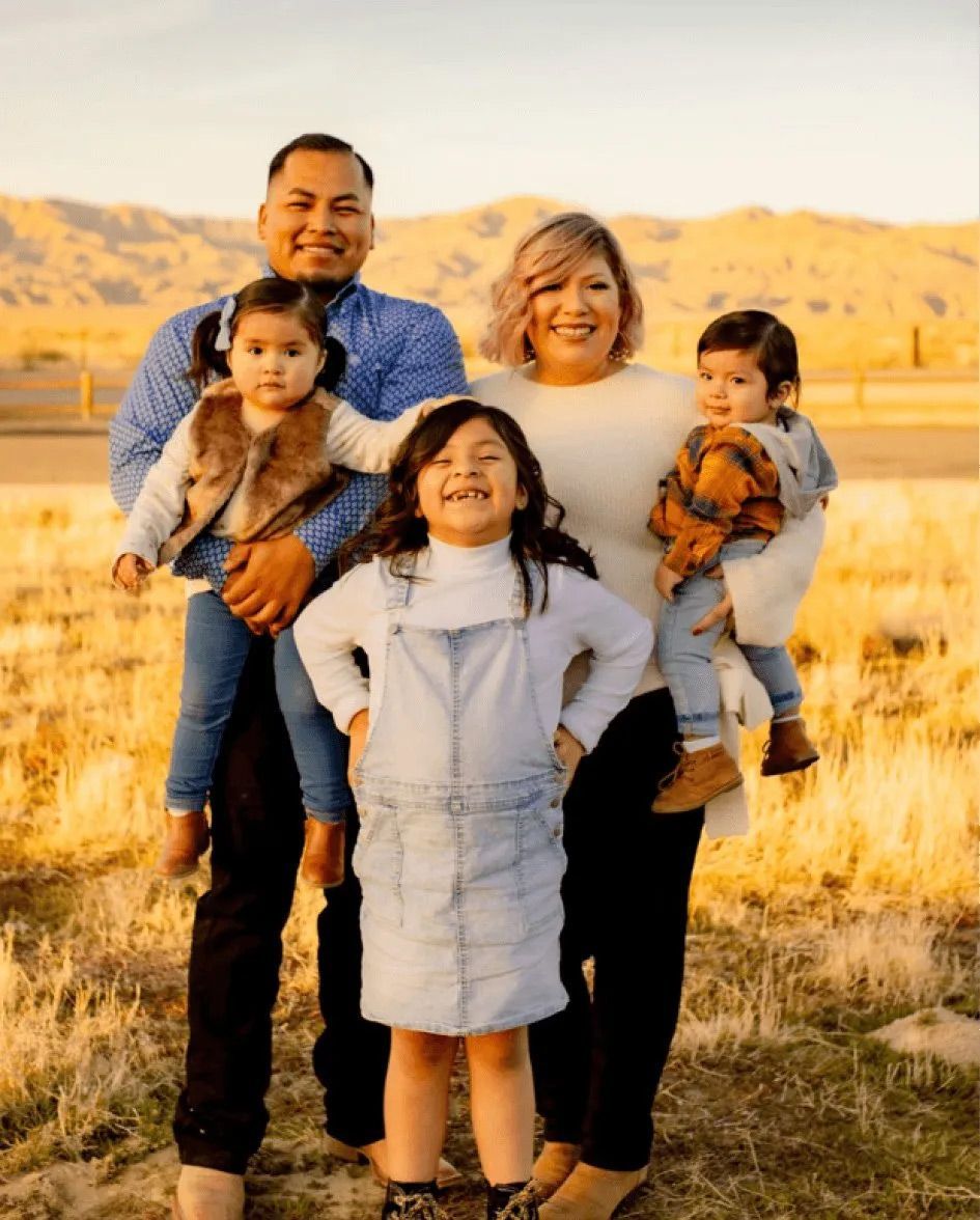 A family posing for a picture in a field — Santa Maria, CA — Zeek's Plumbing