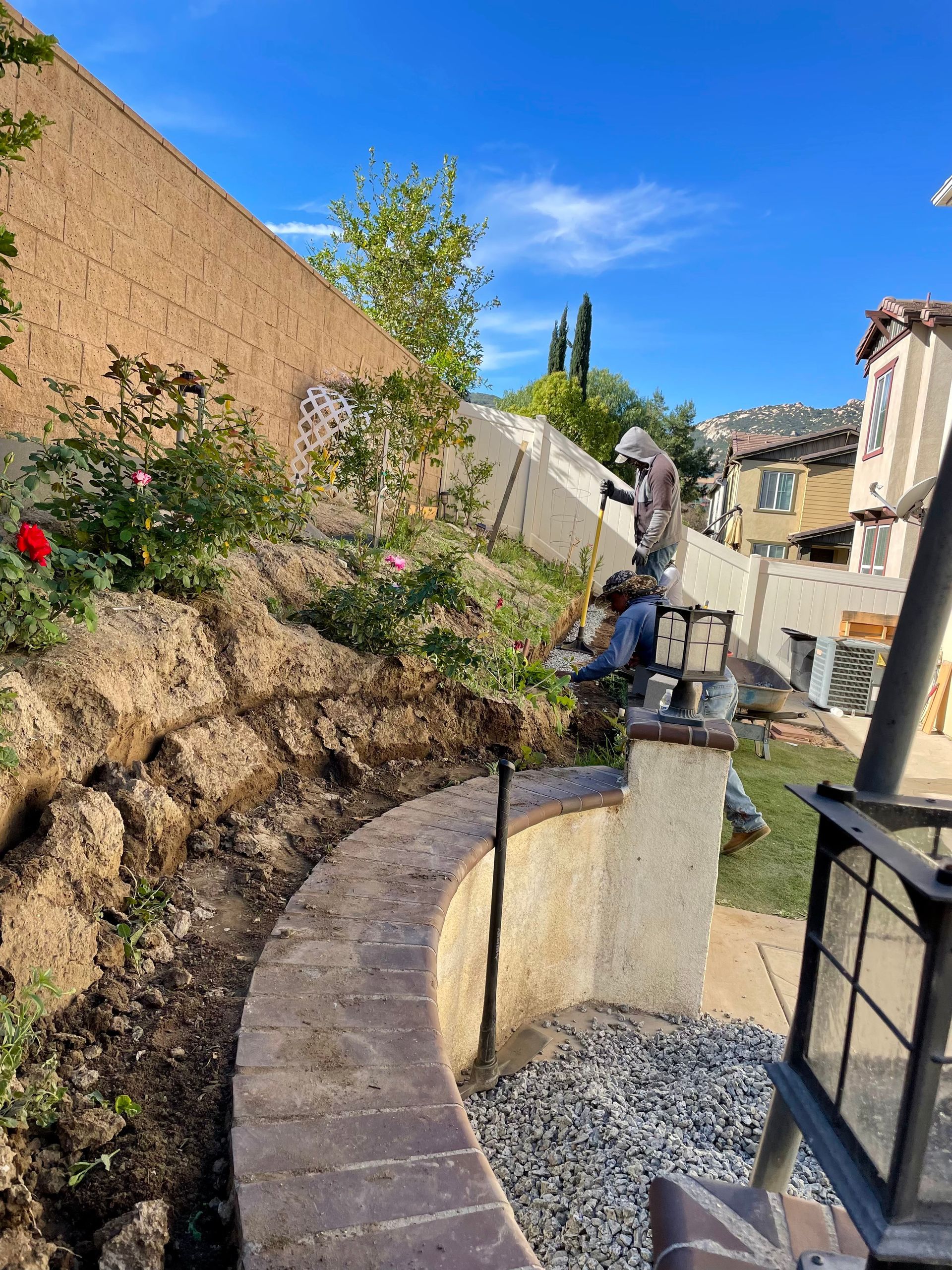 sod installation in progress in backyard