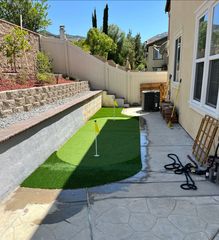 putting green in backyard landscape design