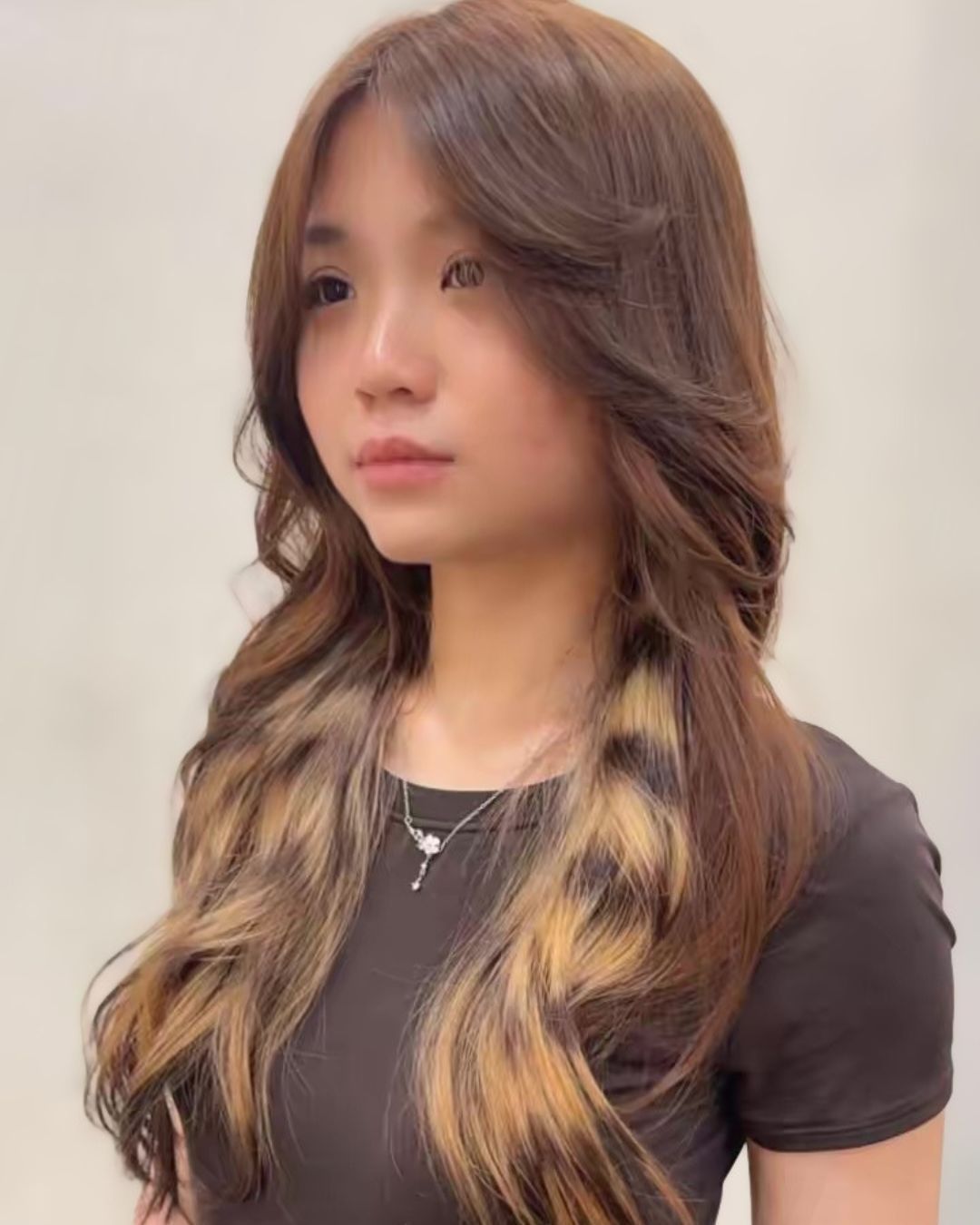 An image of a Curtain fringe with a middle or off-centre part