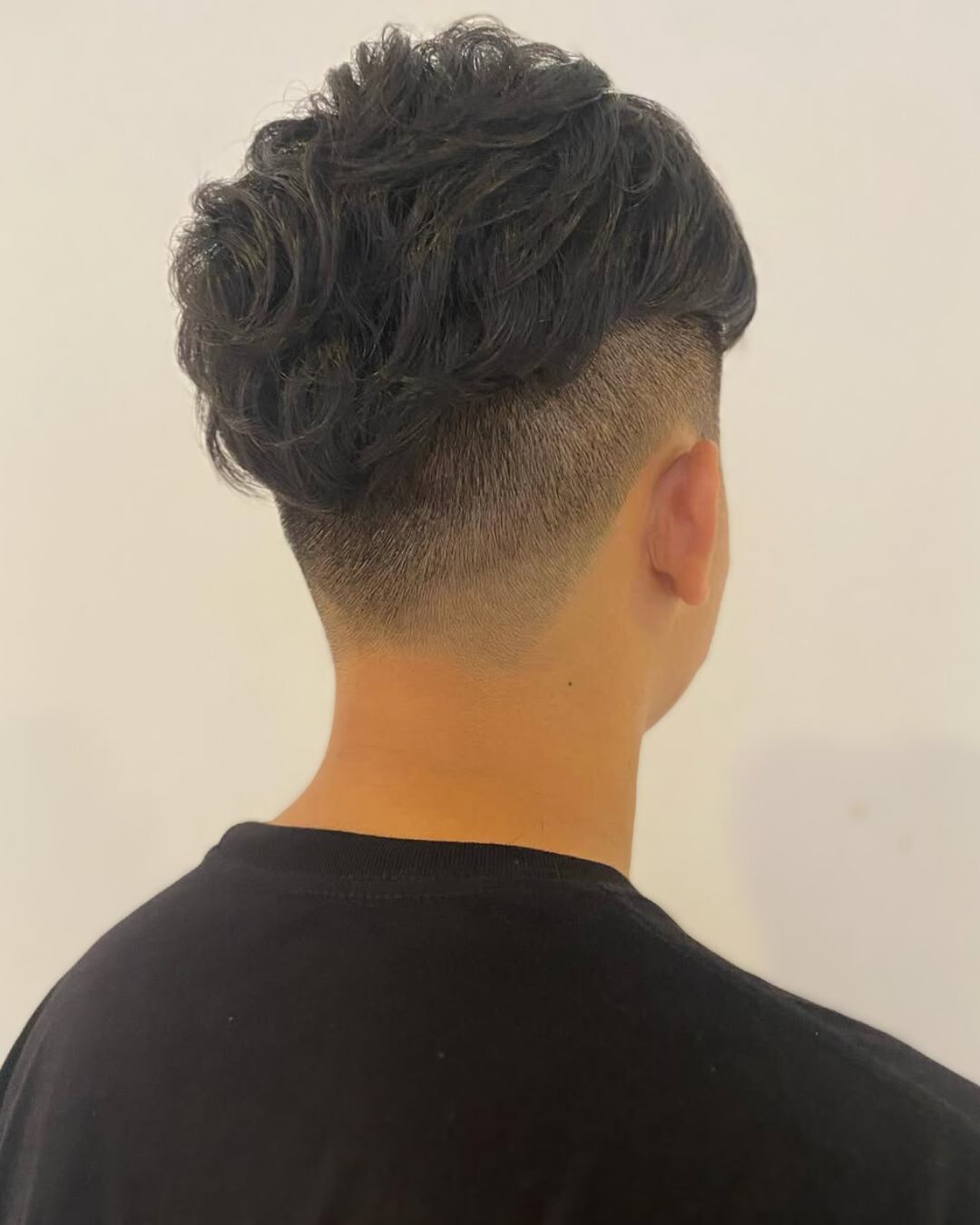 A photo of a Undercut a Top Haircut for Men in Singapore