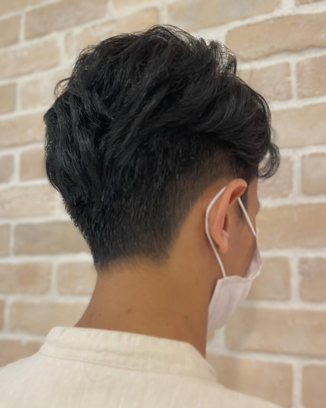 A photo of Textured Crop a Top Haircut for Men in Singapore