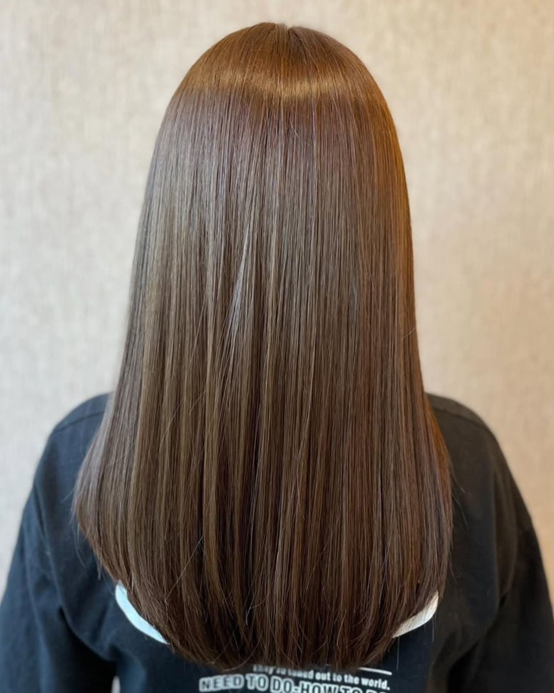 This is a photo of a Ash Brown hair color