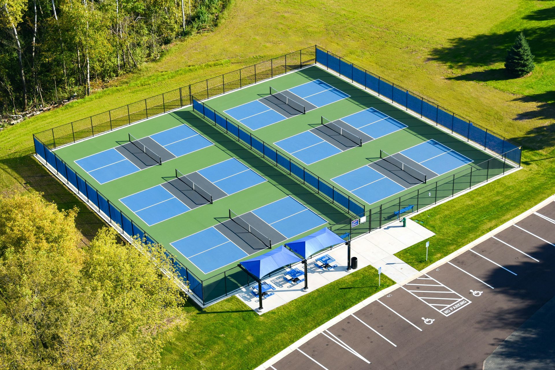 a blue tennis court with a white net