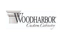 The logo for wood harbor custom cabinetry is black and white.