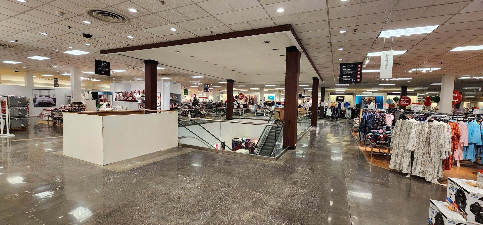 A large store with a lot of clothes on display