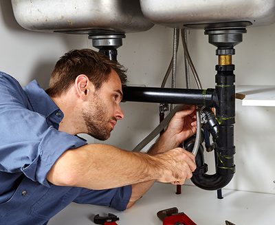 Plumber Fitting Sink Pipe — Wesley Chapel, FL — Tri-Care Services Inc
