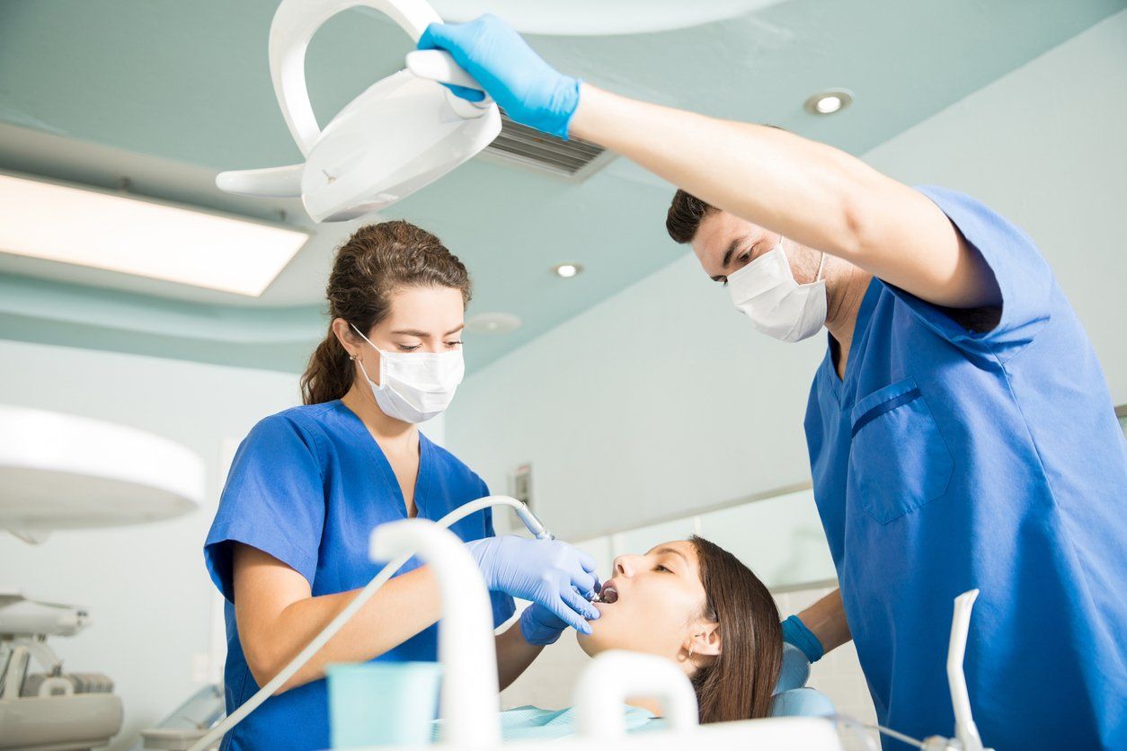 at the dentist getting teeth cleaned