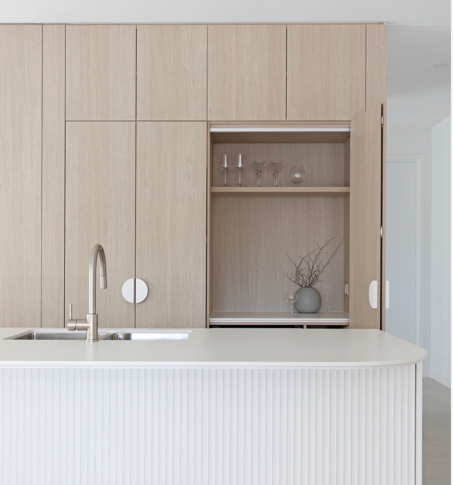 Kitchen Cabinet with Pull-Out Shelves Holding Cookware  — Lukas Joinery in Belmont, NSW