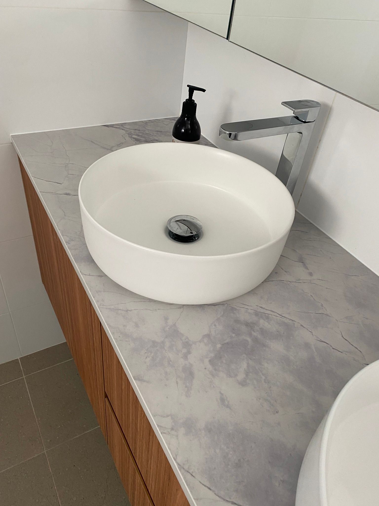 White Vessel Sink on A Marbled Countertop  — Lukas Joinery in Belmont, NSW