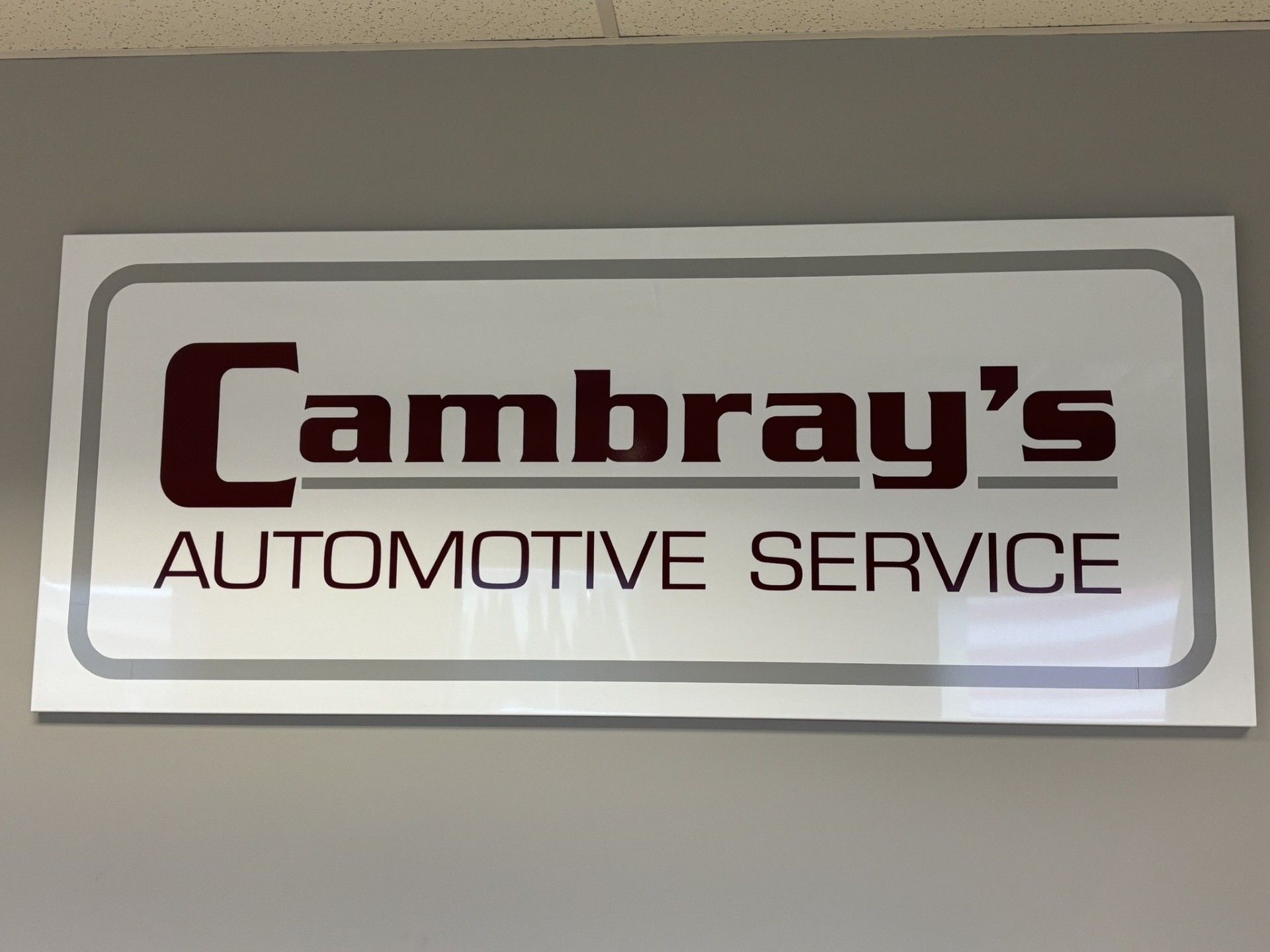 A sign for redlon & johnson is in front of a brick building