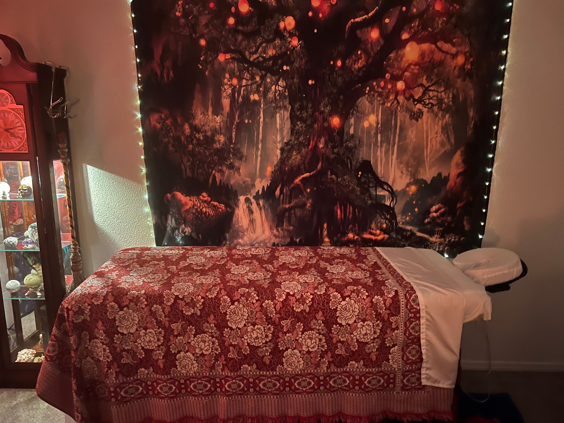 “Sound bath and chakra healing tools including singing bowls, crystals, and gentle candlelight.”