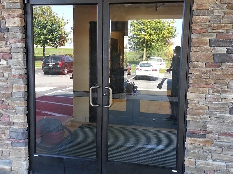 Commercial building glass door  - Exterior glass replacement in Fort Wayne, IN