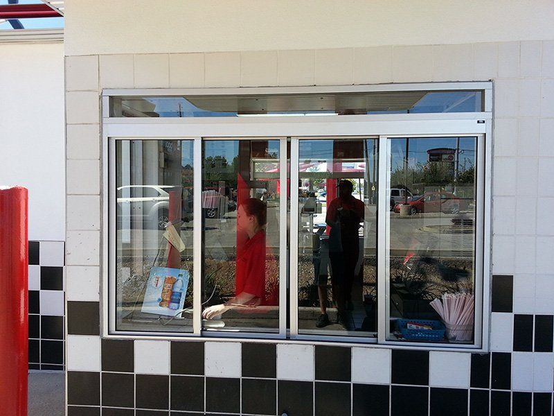 Rallys storefront - Exterior glass replacement in Fort Wayne, IN