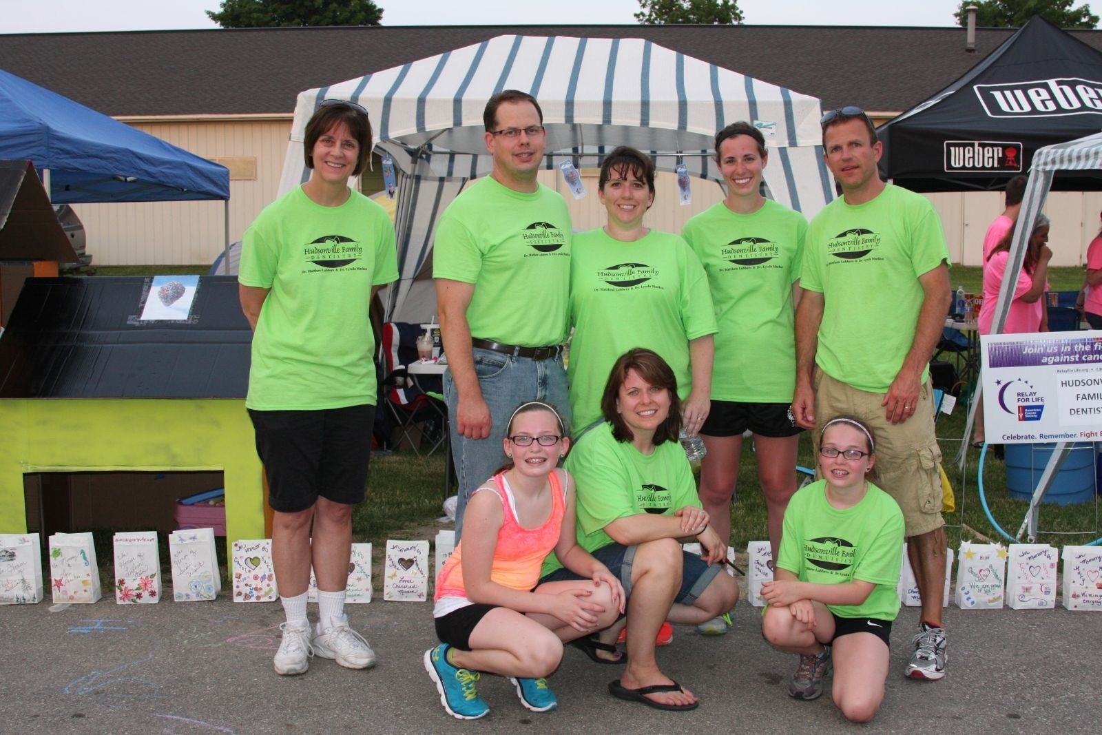 Family Picture Wearing Green Shirt — Hudsonville, MI — Hudsonville Family Dentistry