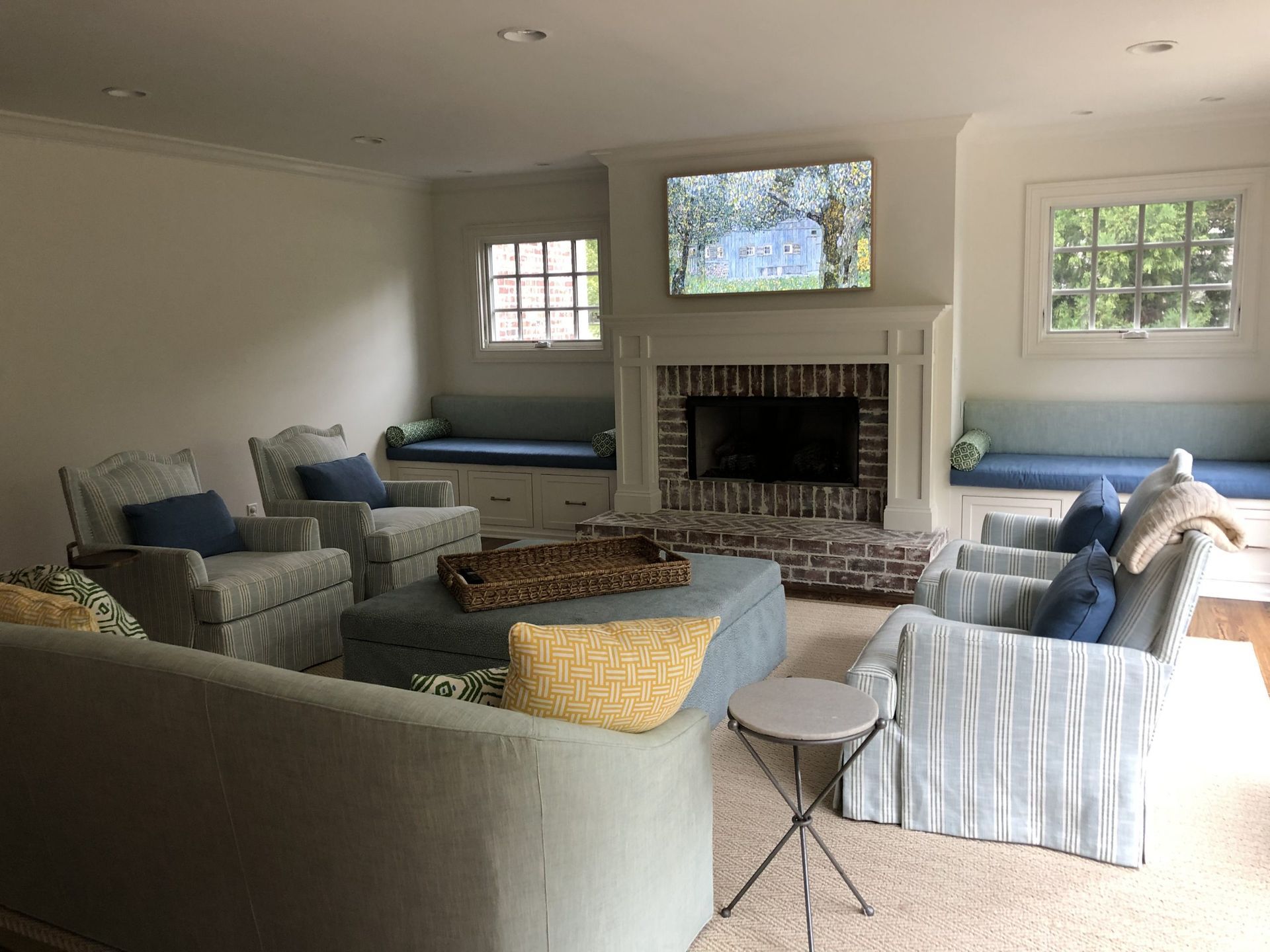 A living room filled with furniture and a fireplace.