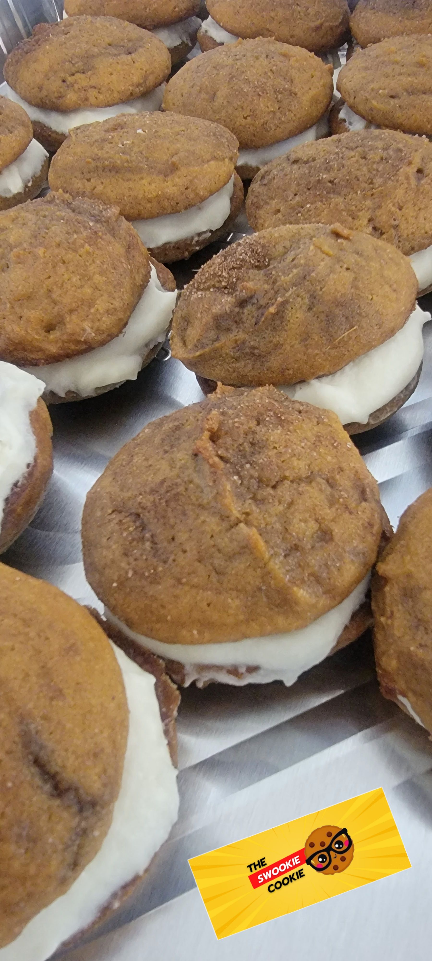 A bunch of cookies sitting on top of each other on a table.