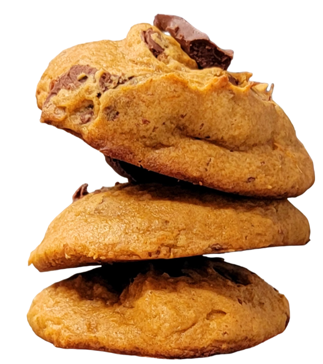 Three chocolate chip cookies are stacked on top of each other