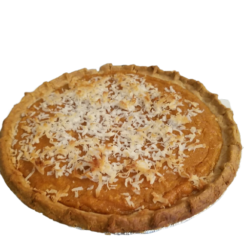 A pumpkin pie with coconut on top of it