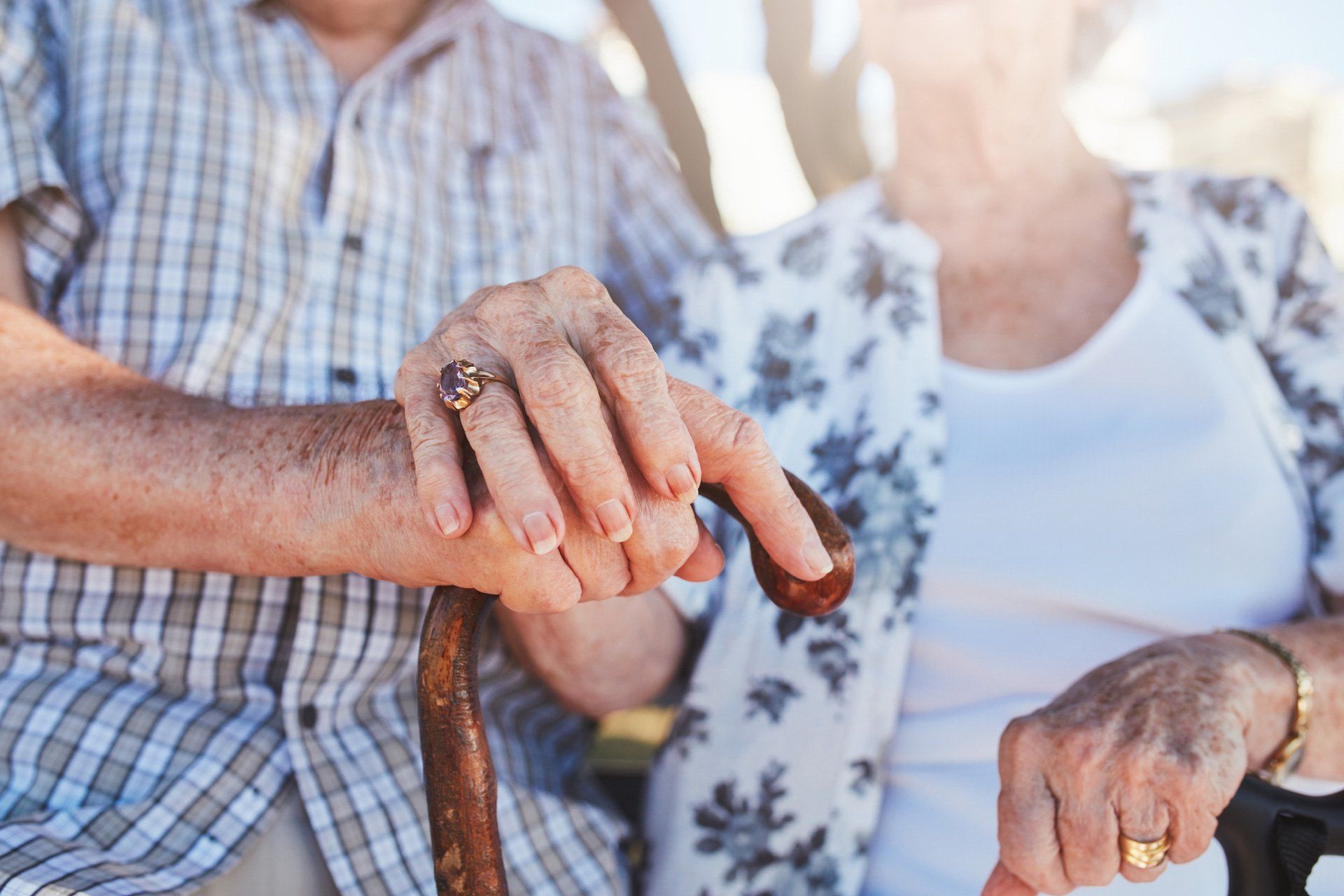 Elderly Care Taker — Senior Couple Holding Hands in Marco Island, FL