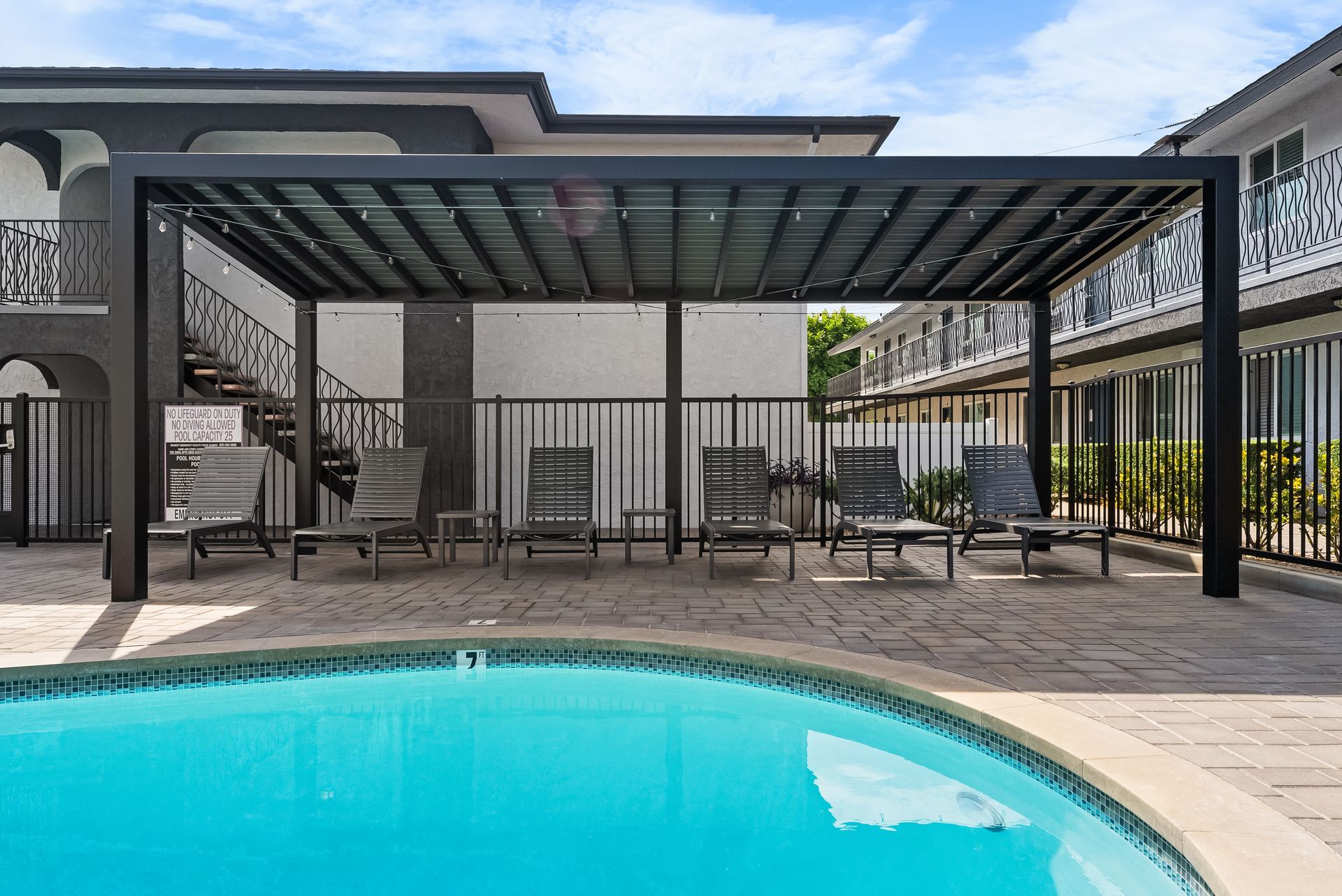 lounge chairs and pool