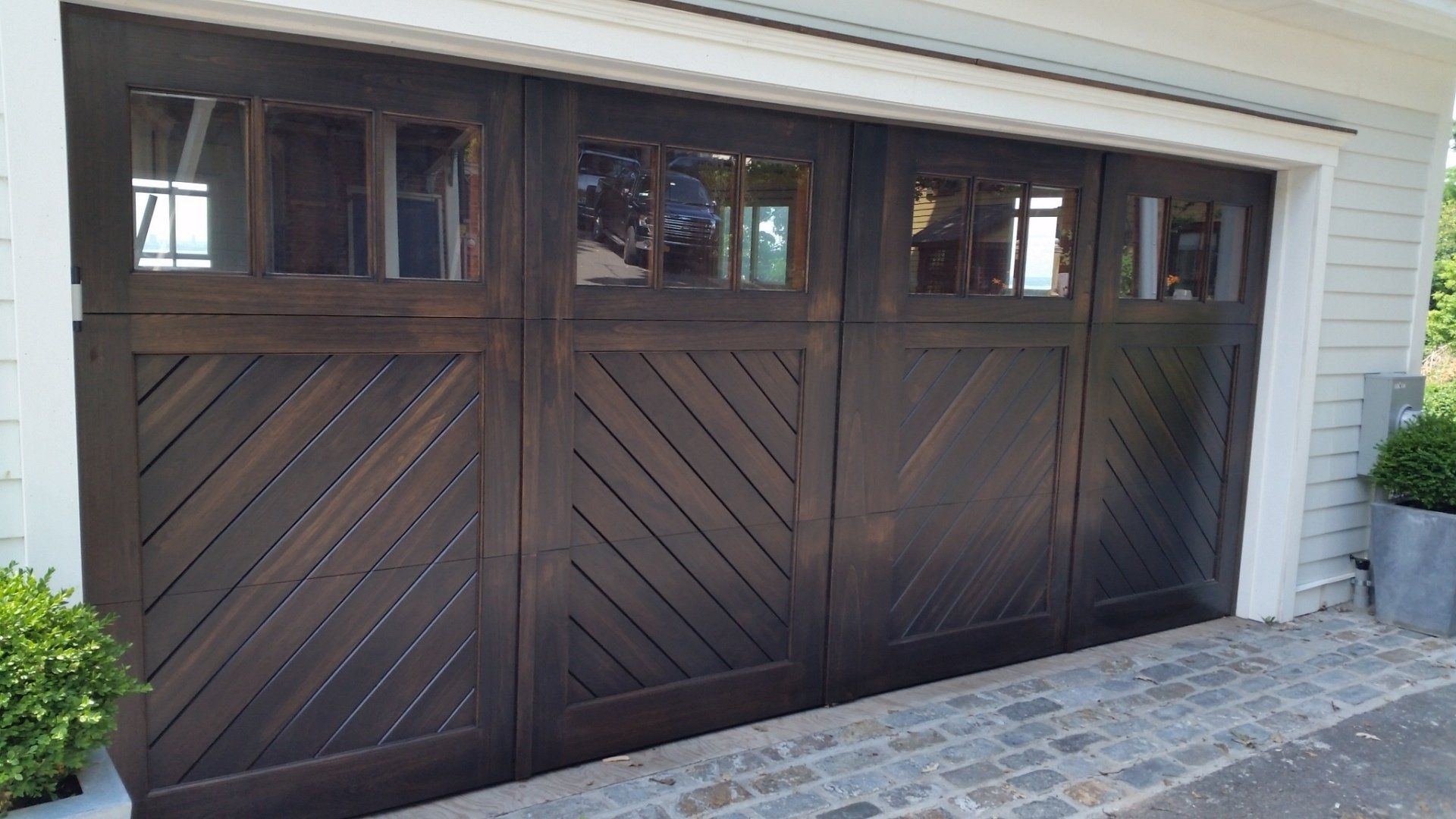Custom carriage door for residential property in Suffolk County