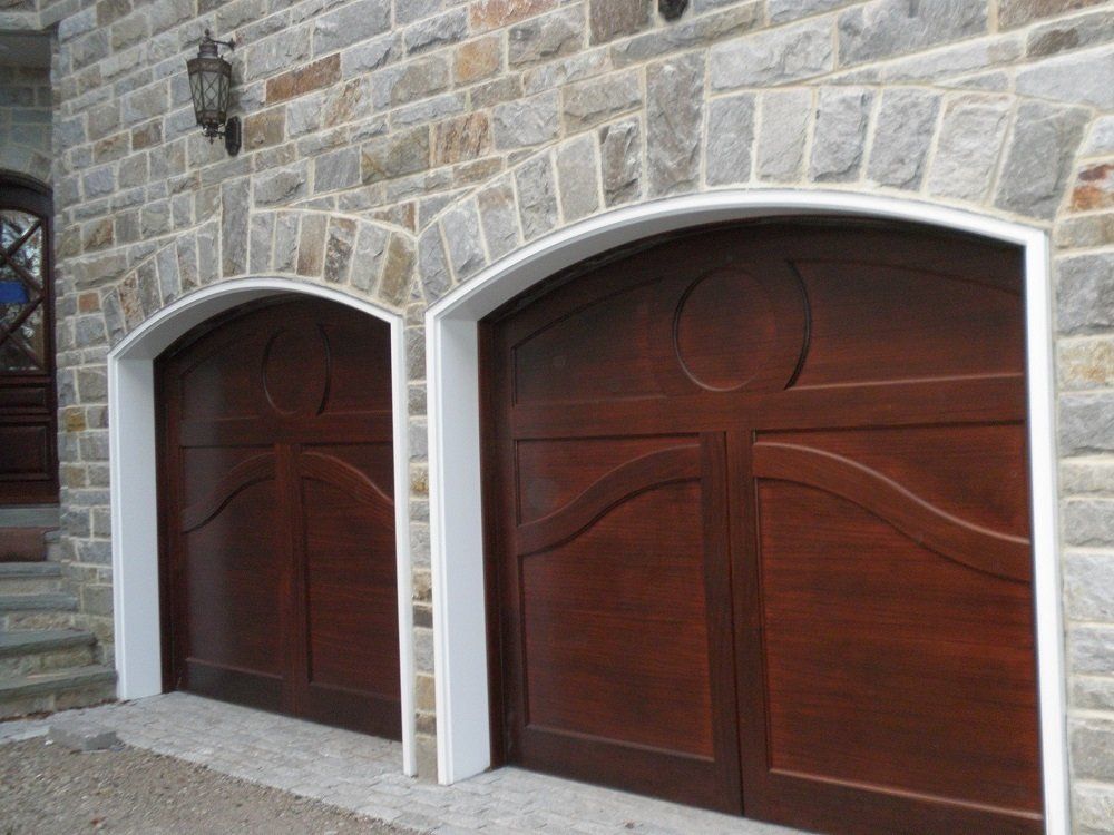 Custom Garage Doors made of brick in Nassau County