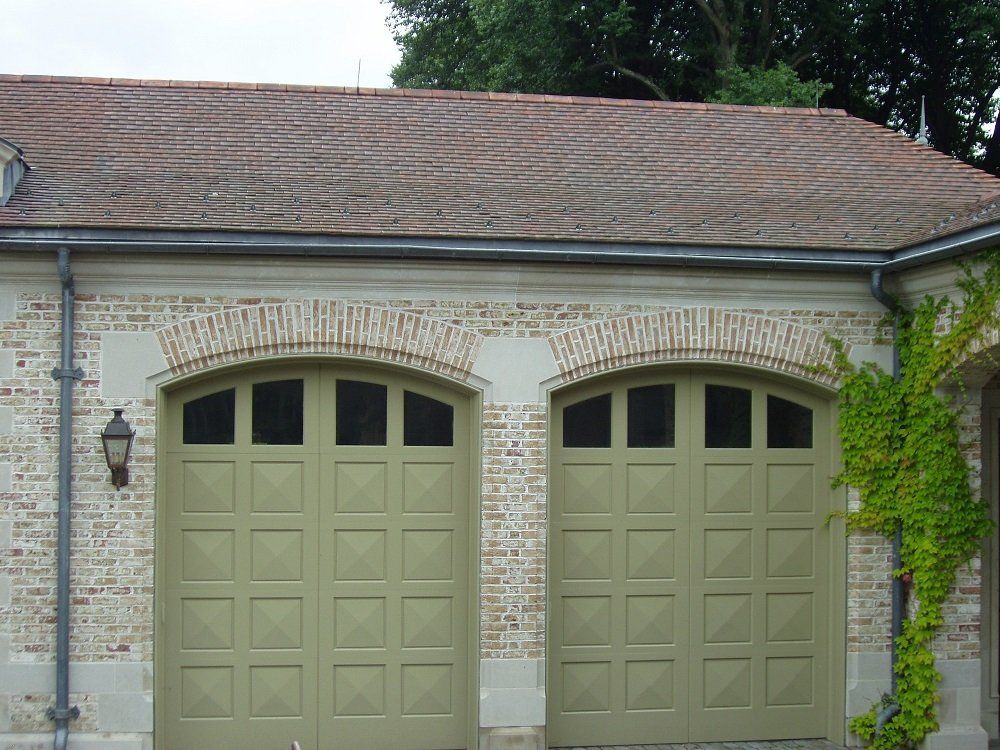 Double-sided custom garage door in Suffolk County
