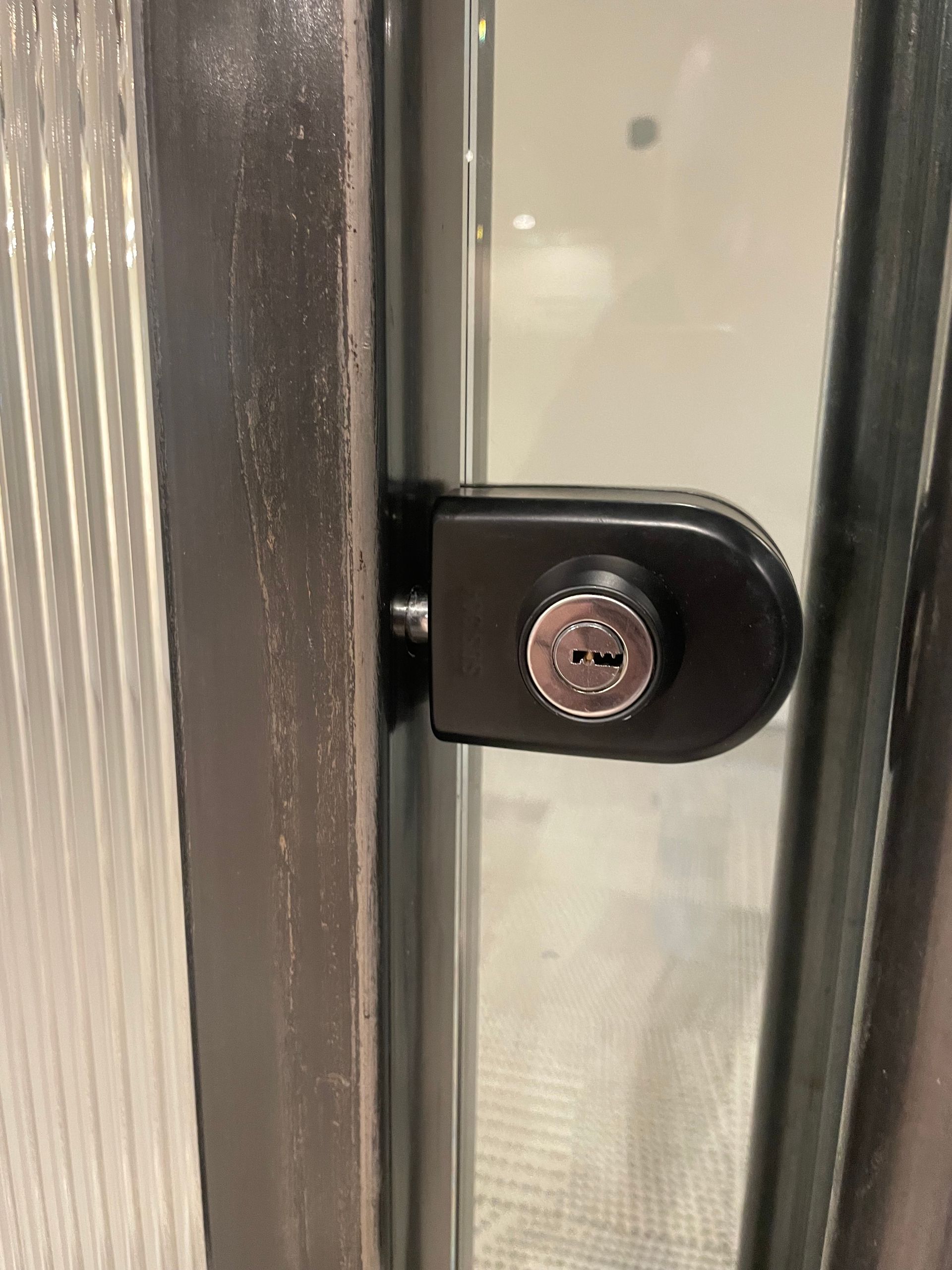 A close up of a door with a lock on it.