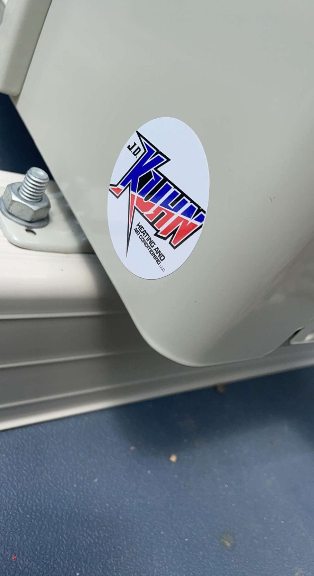 A white container with a sticker on it that says killer fish