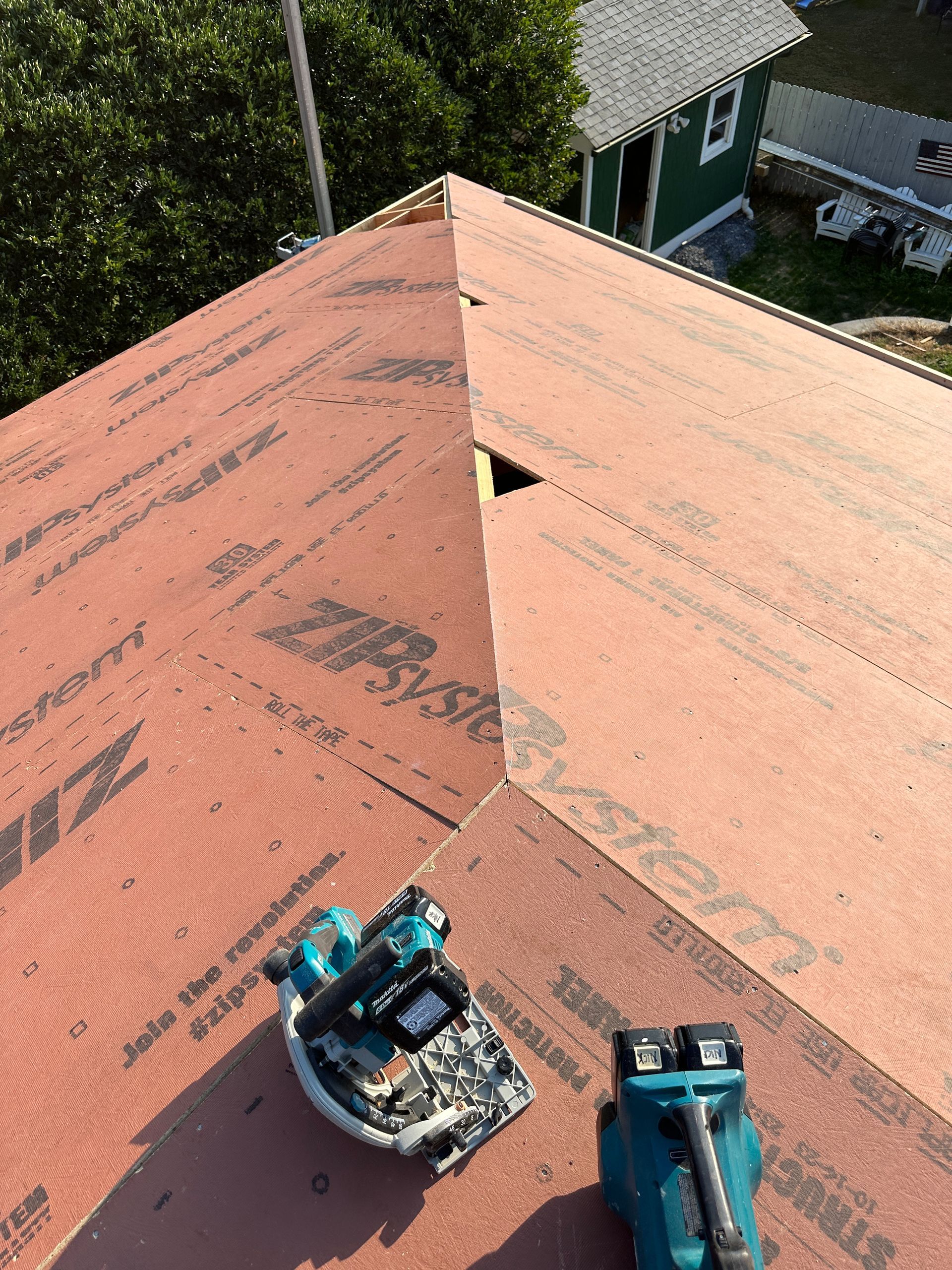 A zipsystem roof is being installed on a house