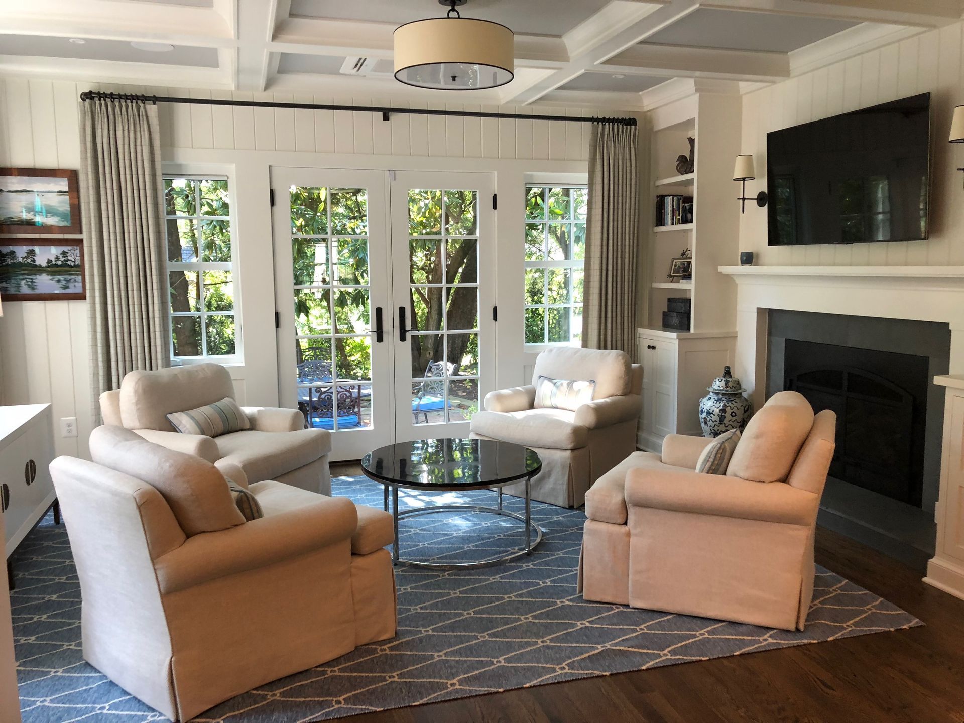 A living room filled with furniture and a fireplace