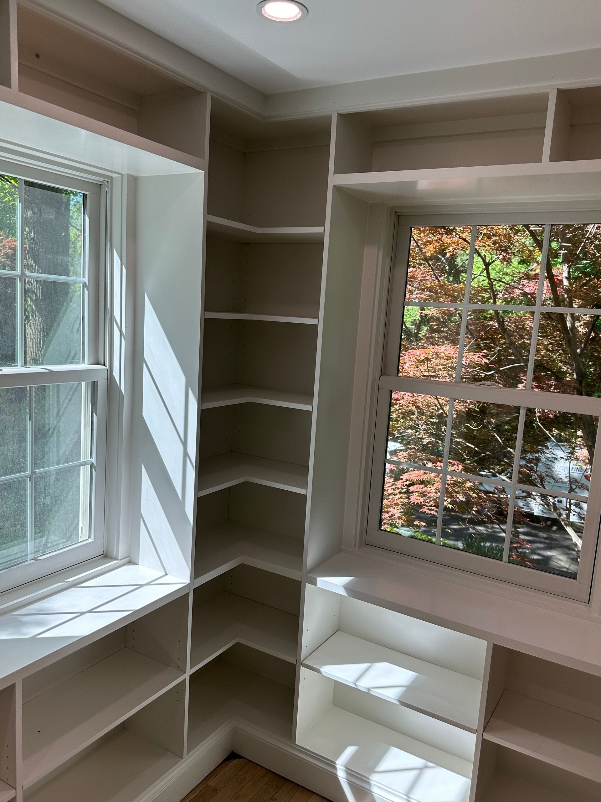 A view of the floating custom  corner shelves