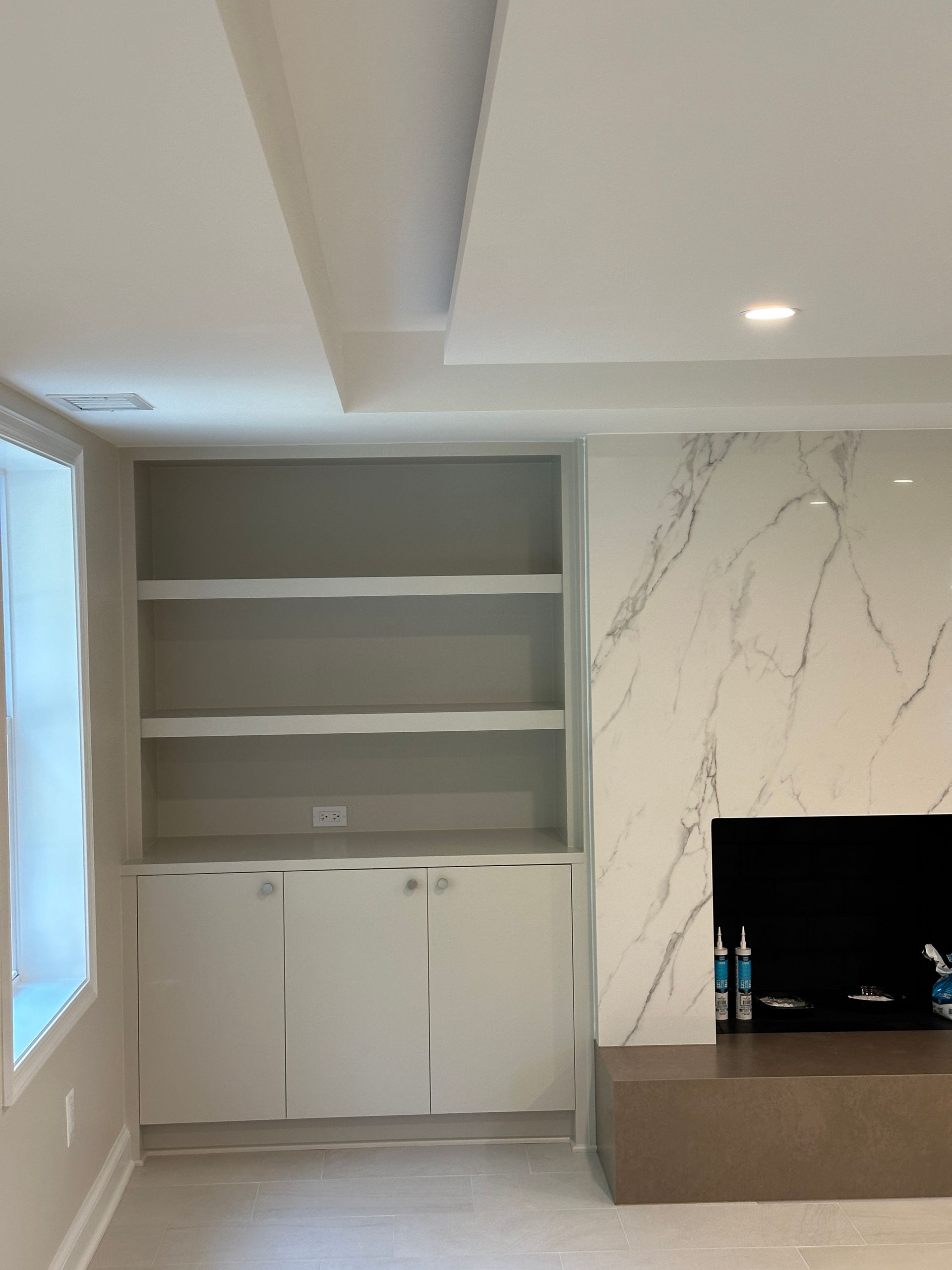 custom porcelain wall with custom space for built in tv