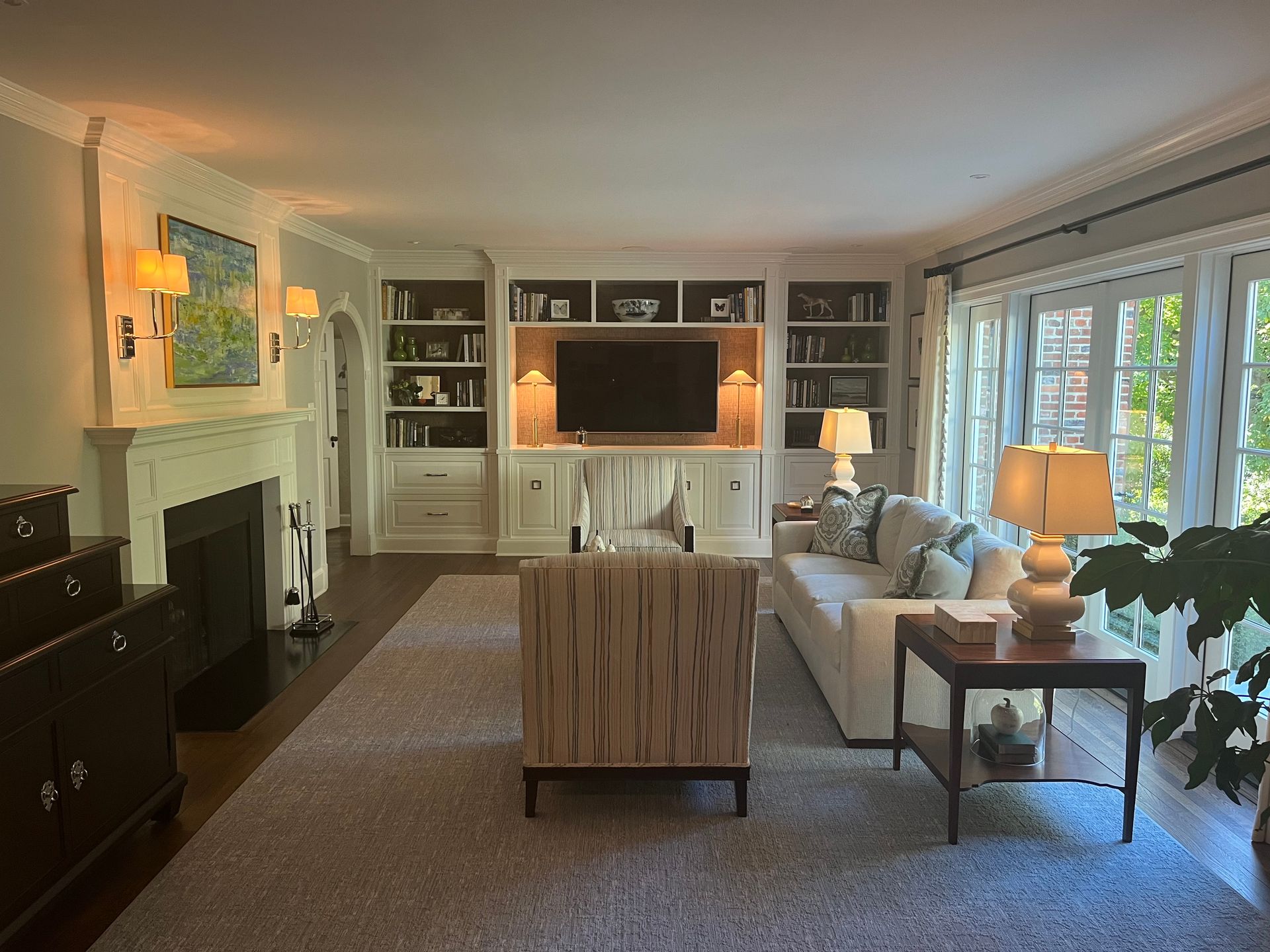 A living room filled with furniture and a flat screen tv