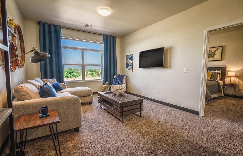 living room with mounted tv