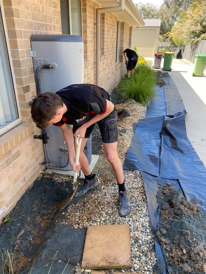 Two Workers Are Digging — Professional Pest Control In Thurgoona NSW