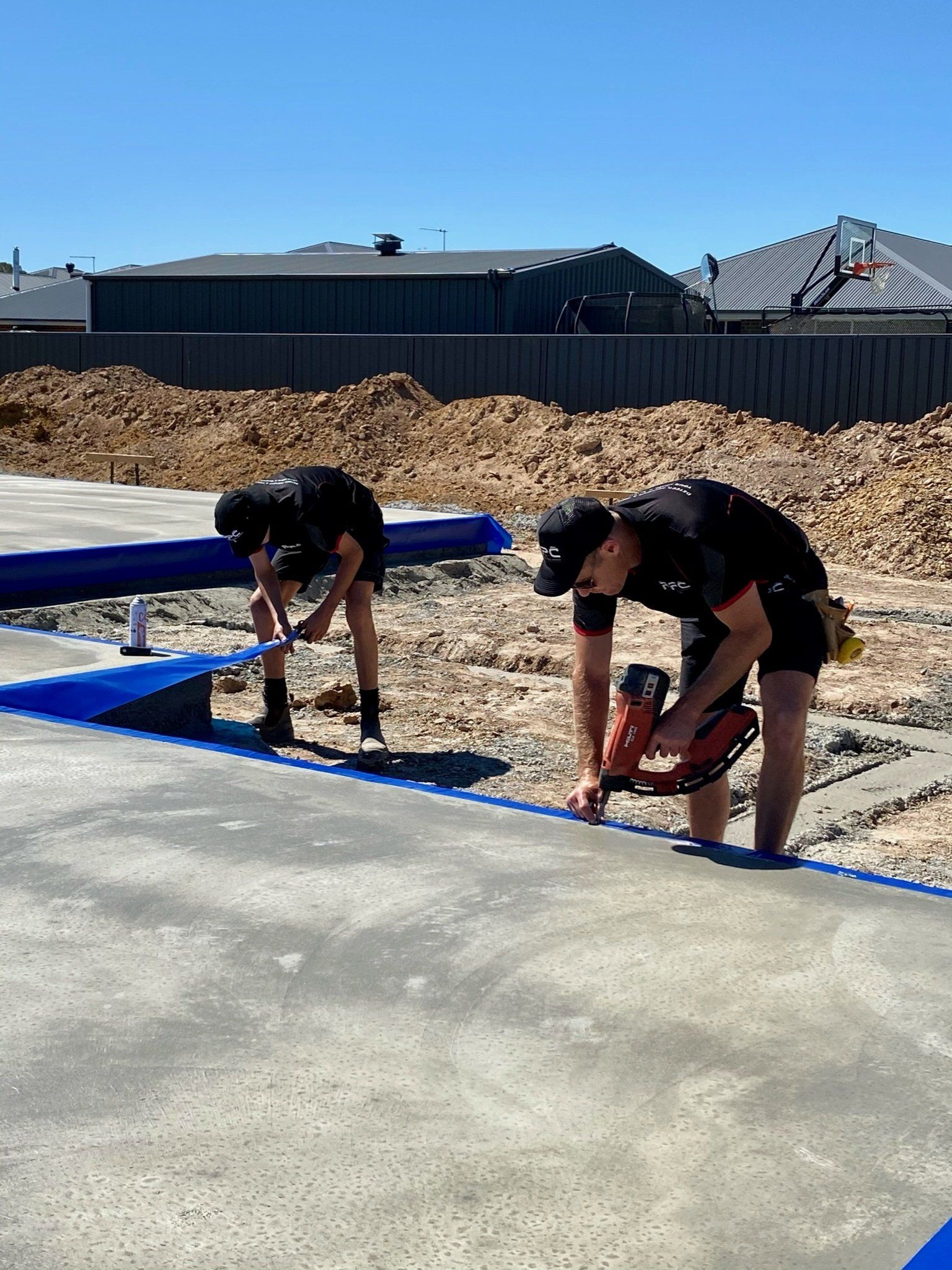 Technicians doing Pre-Construction Termite Protection — Professional Pest Control In Thurgoona NSW