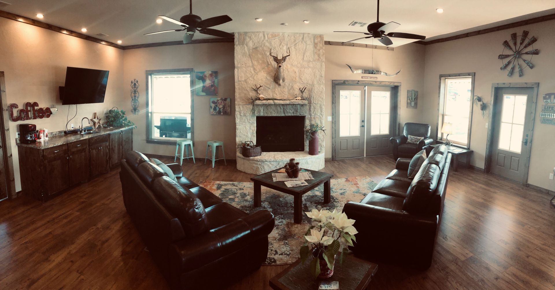 A living room filled with furniture and a fireplace.