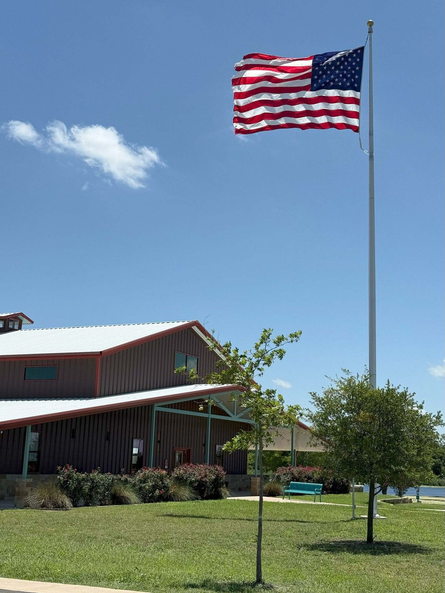 A red building with a sign that says basin rv resort