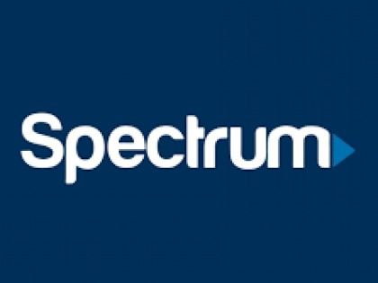 The spectrum logo is on a blue background.