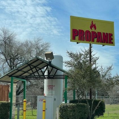 A yellow sign that says propane on it