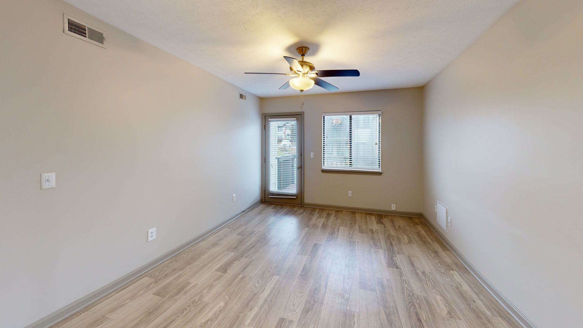 Kitchen with stainless steel appliances and updated cabinetry. 