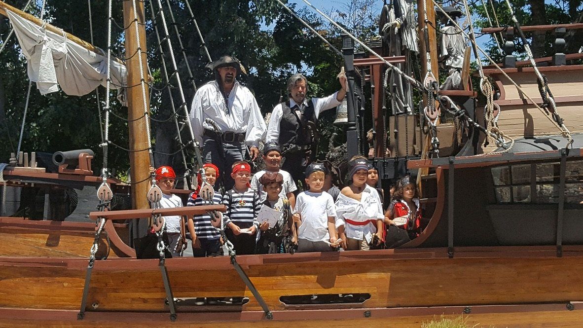 Rich Firato with kids after a tour